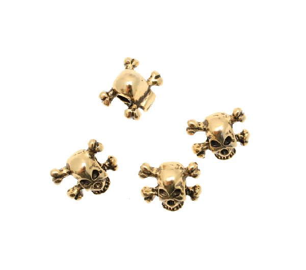 Distanziatore a forma di teschio bombato con ossa incrociate, foro passante orizzontale tempia-tempia, 15x13 mm.
