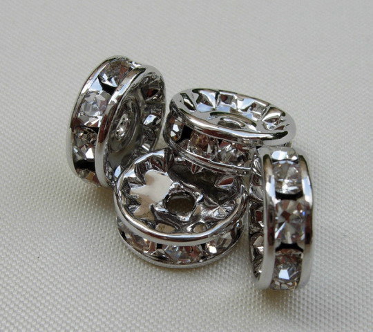 Rondella strass, 6 mm., base Rodio