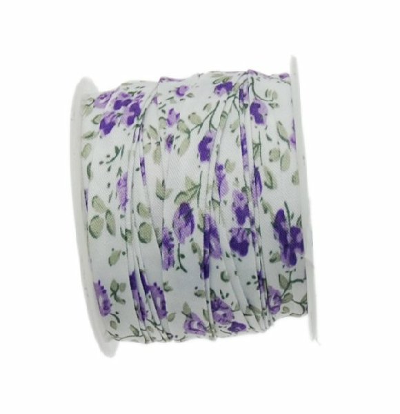 Nastro piatto, a sbieco piegato, in poliestere , alto 10 mm., colore FIORATO SU BASE BIANCA