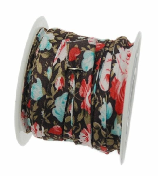 Nastro piatto, a sbieco piegato, in poliestere , alto 10 mm., colore FIORATO SU BASE MARRONE