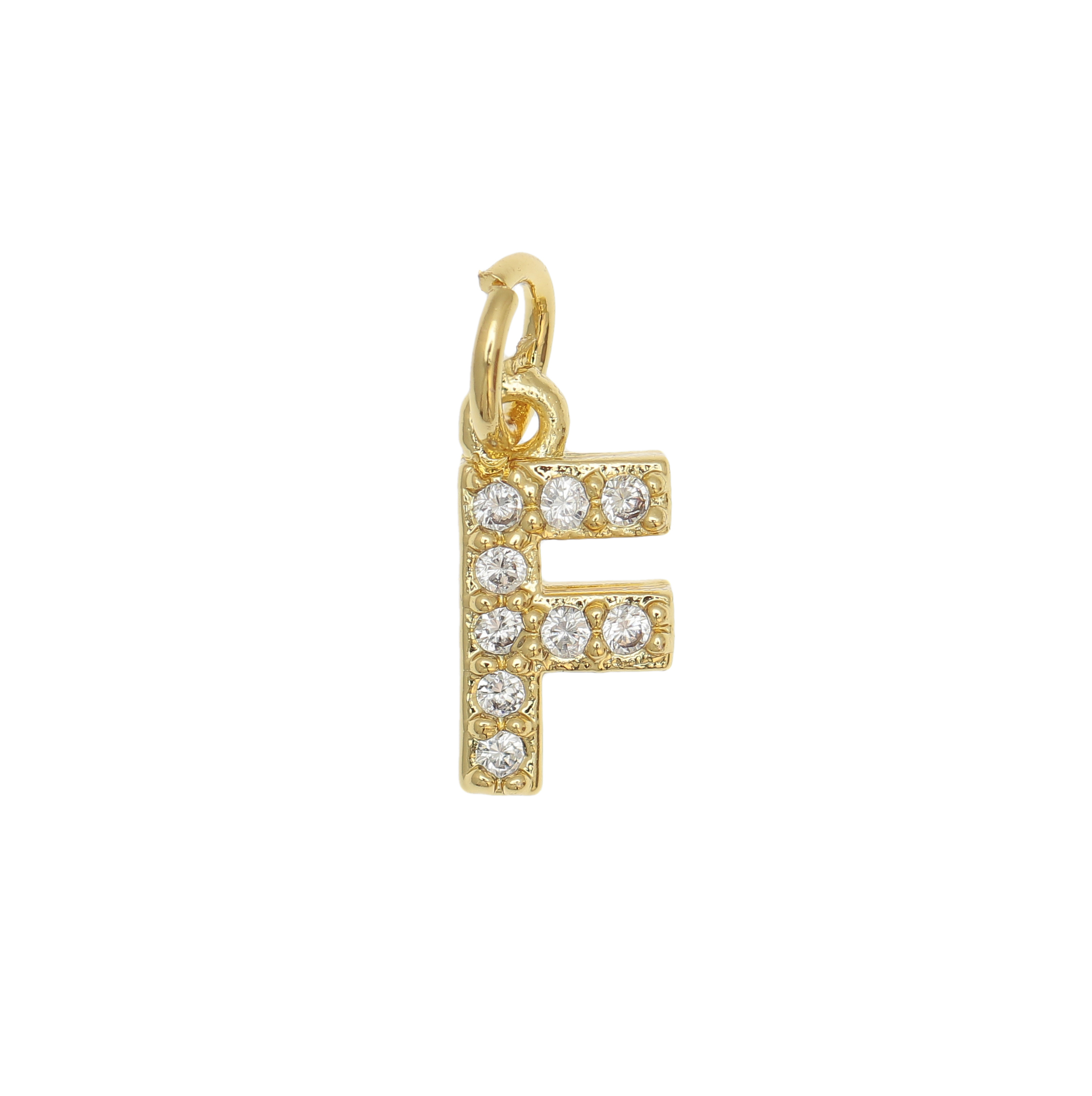 Ciondolo a forma di lettera "F", 9x4 mm., strass colore Crsytal, base colore Oro Lucido