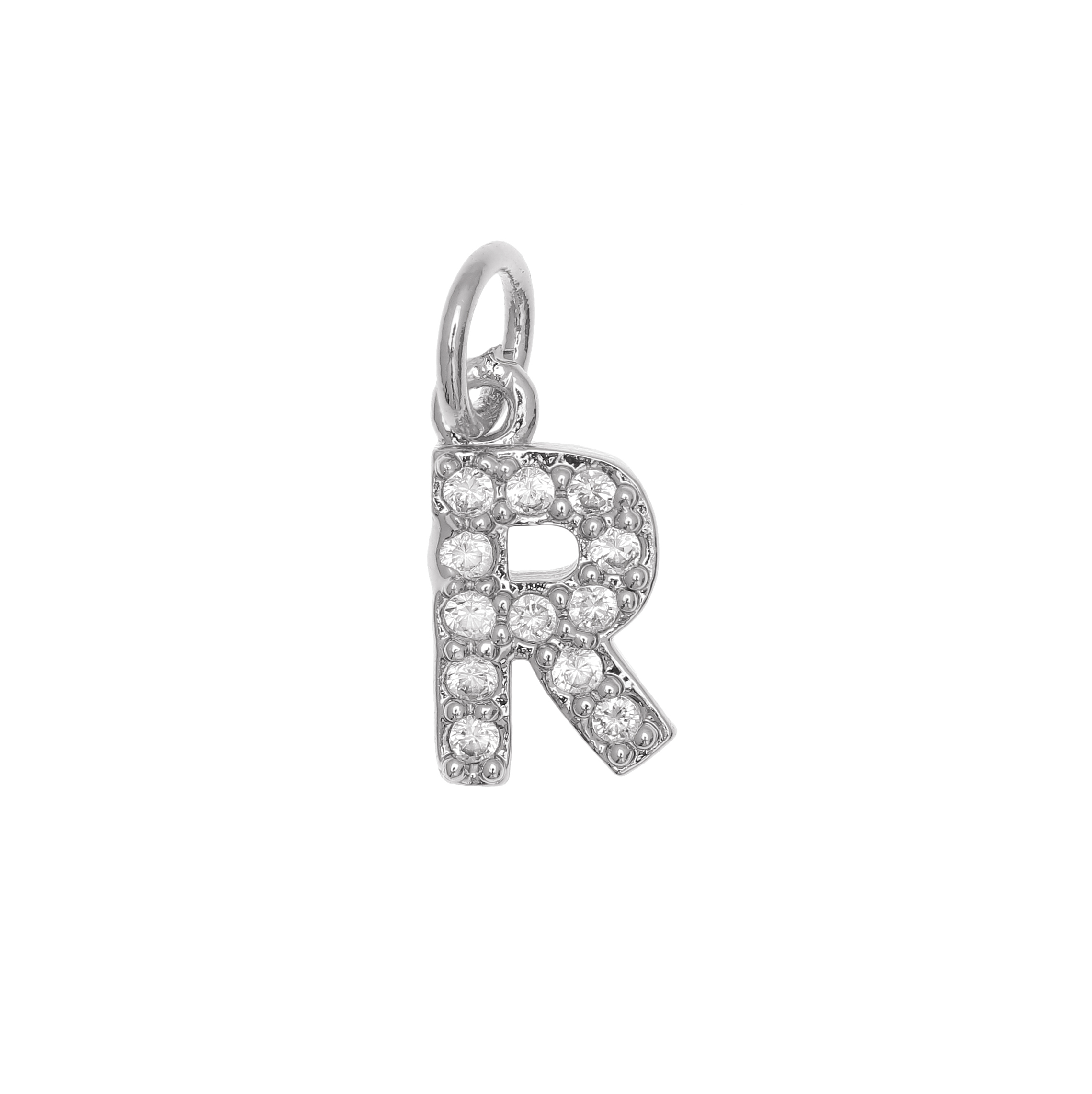 Ciondolo a forma di lettera "R", 9x5 mm., strass colore Crystal, base colore Argento Rodio
