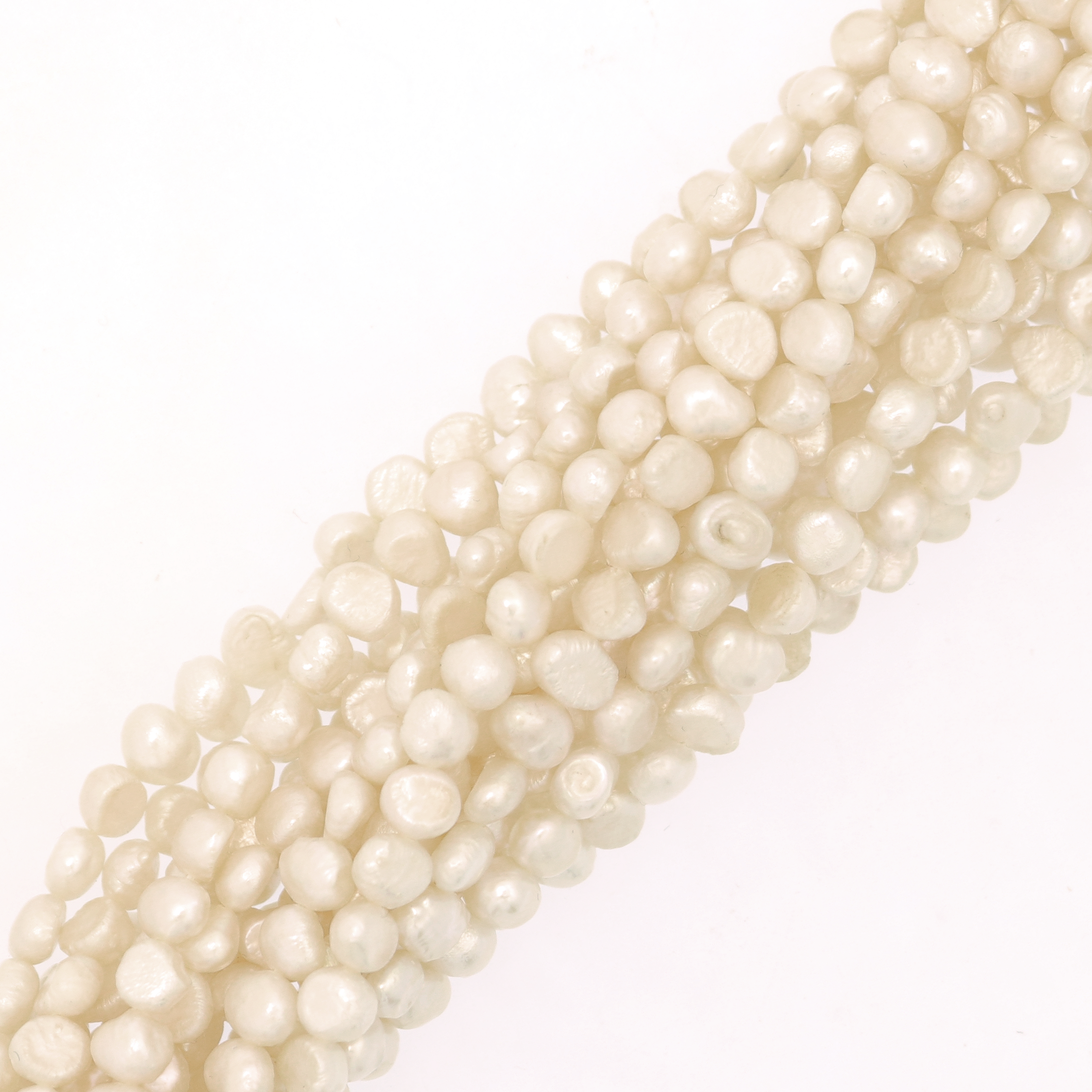 Filo Perle di Fiume tonde piatte irregolari, misura 4.5x5.5mm 