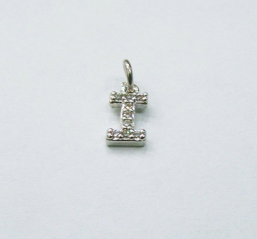 Ciondolo a forma di lettera "I", 9x5 mm., strass colore Crystal, base colore Argento Rodio