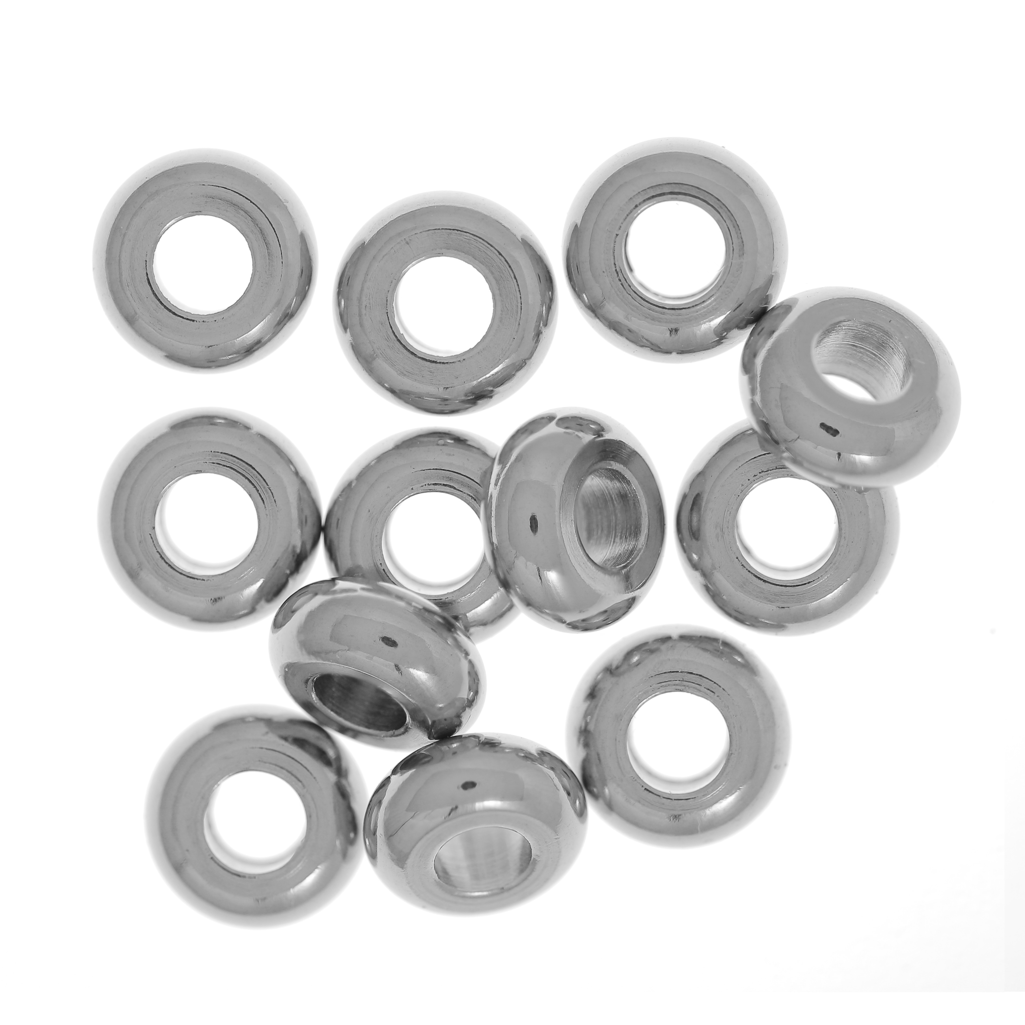 Distanziatore a forma di rondella liscia, leggermente bombata, 3x1,5x1,4 mm., in Acciaio