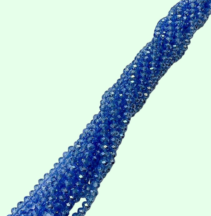 Filo di Cipollotti in Cristallo, 6x4 mm, colore ZAFFIRO CHIARO TRASPARENTE LISTRATO